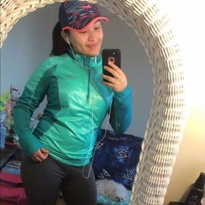 Turquoise North Face Light Jacket